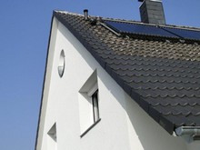 Ortgangverbreiterung für Wärmedämmverbundsystem und Erweiterung des Hauseingangsbereiches