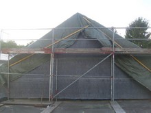 Giebelwand gedämmt und mit Kunstschiefer neu bekleidet